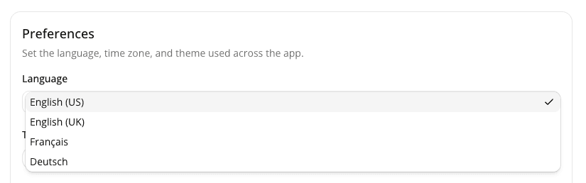 The Language dropdown open, showing English (US), English (UK), Français, and Deutsch.
